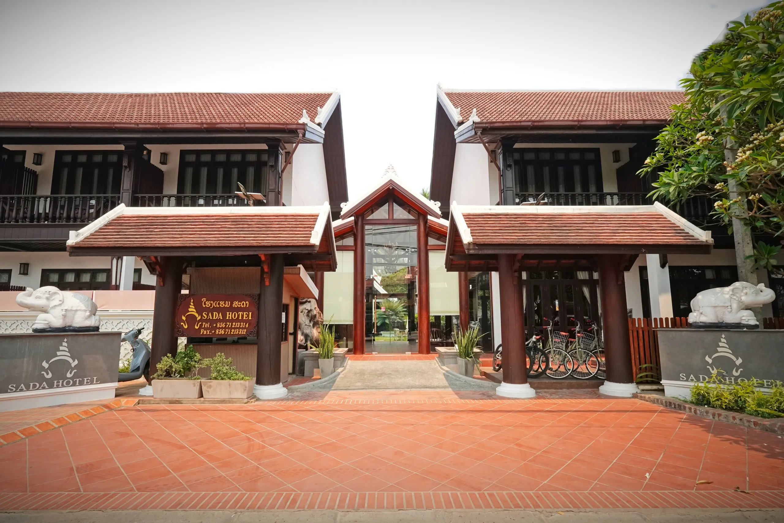 The carved timber entrance gate of Sada Hotel